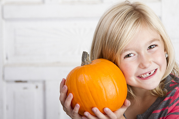 Little Girl With a Pumpkin 